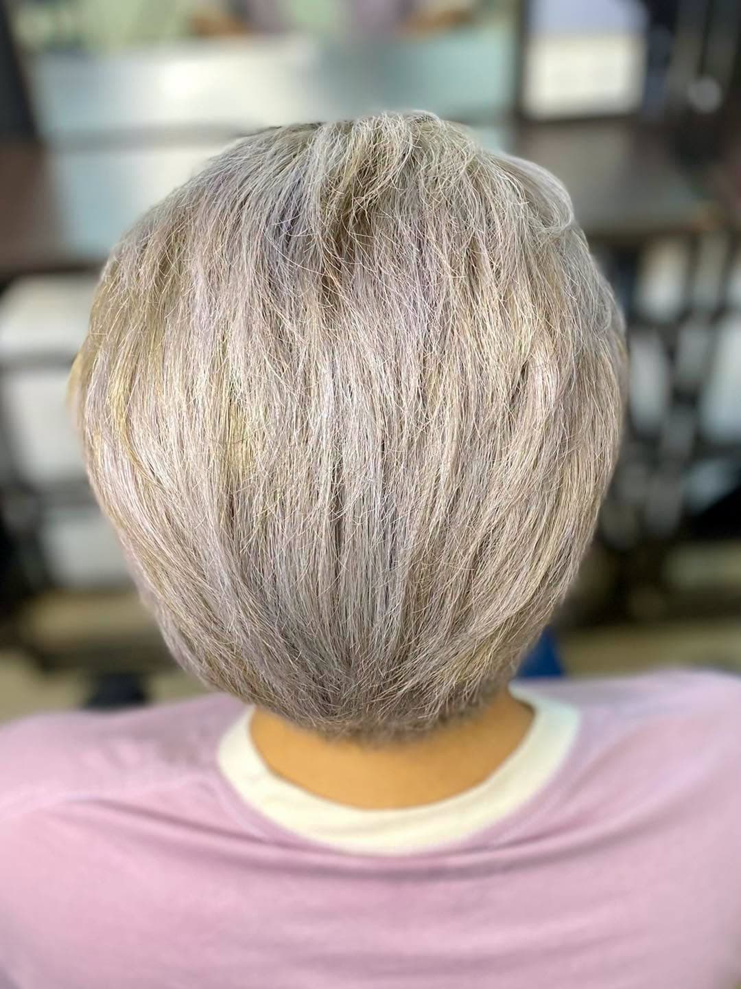 Short silver haircut, seen from behind