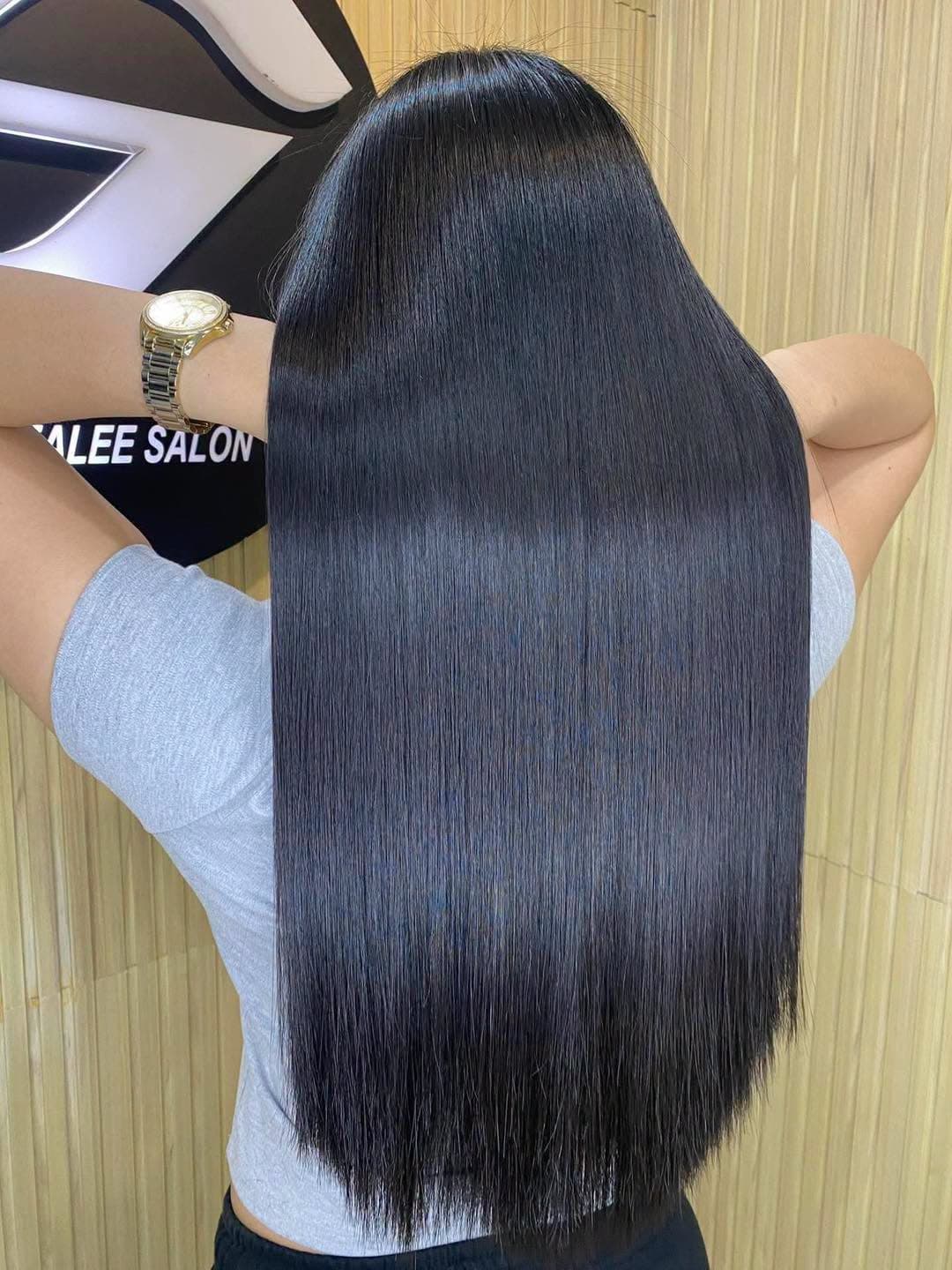 Long, sleek, straight black hair at SandreaLee Salon
