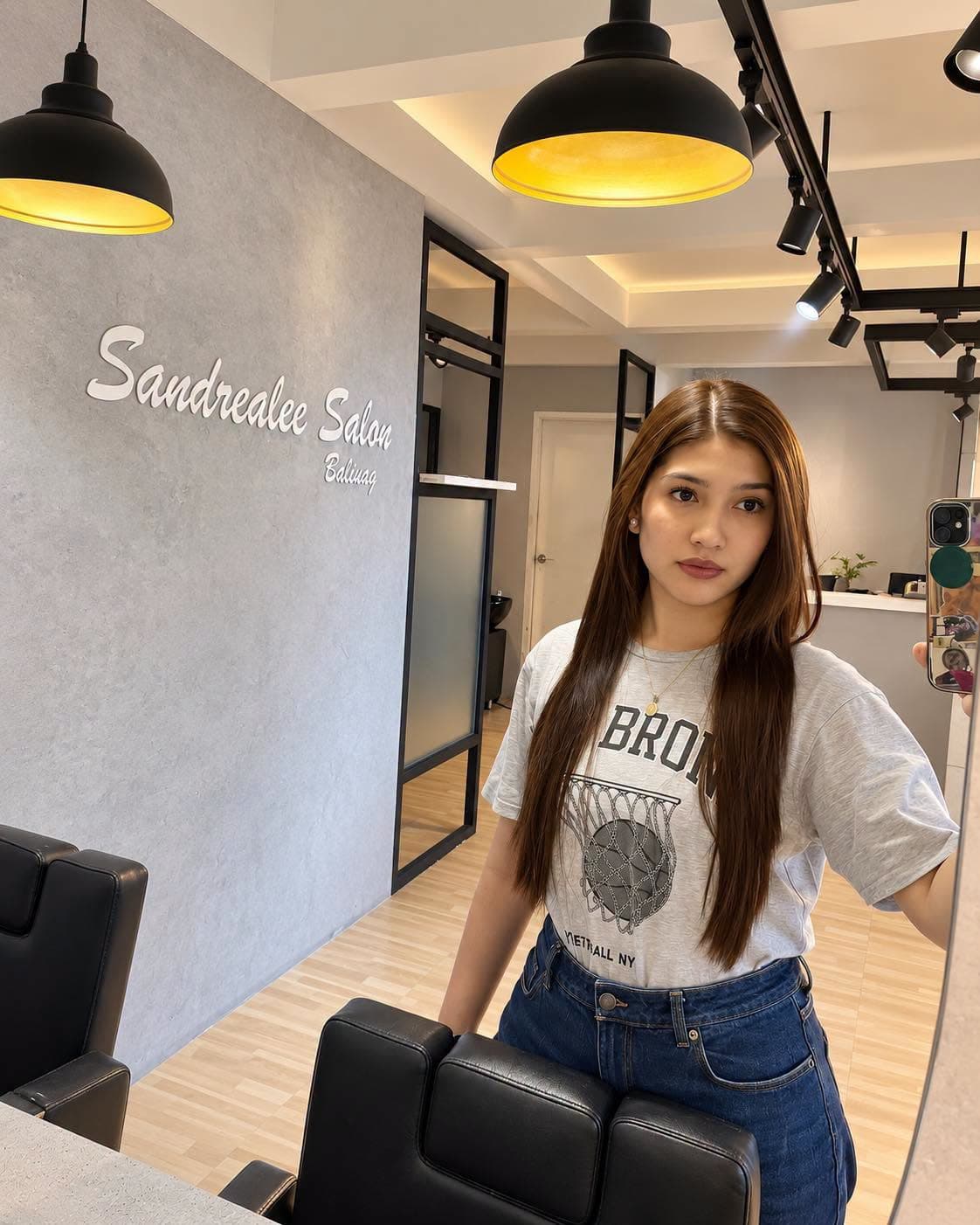 Long, glossy brunette hair, styled in the salon